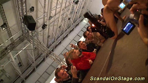 huge-chested stunner going knuckle deep on public stage