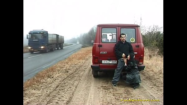 horny whore deep-throats boner on the road