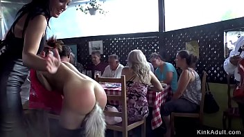 Euro brown-haired stunner bangs in crowded public restaurant terrace