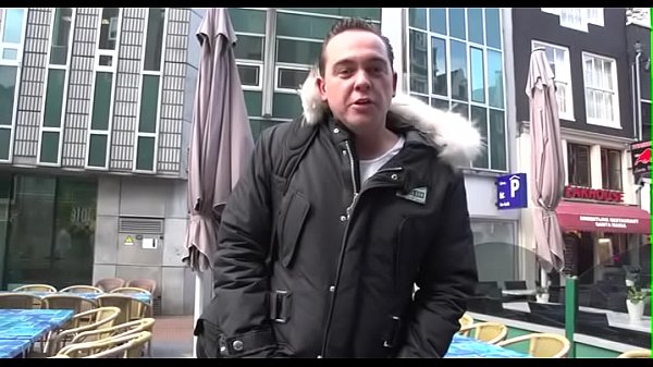 Aged man takes a walk in the amsterdam redlight district