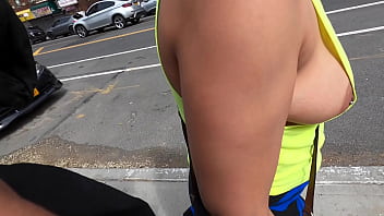 Wife walking  in public braless with nip slipping out