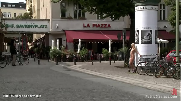 Naked slave bound in the city center